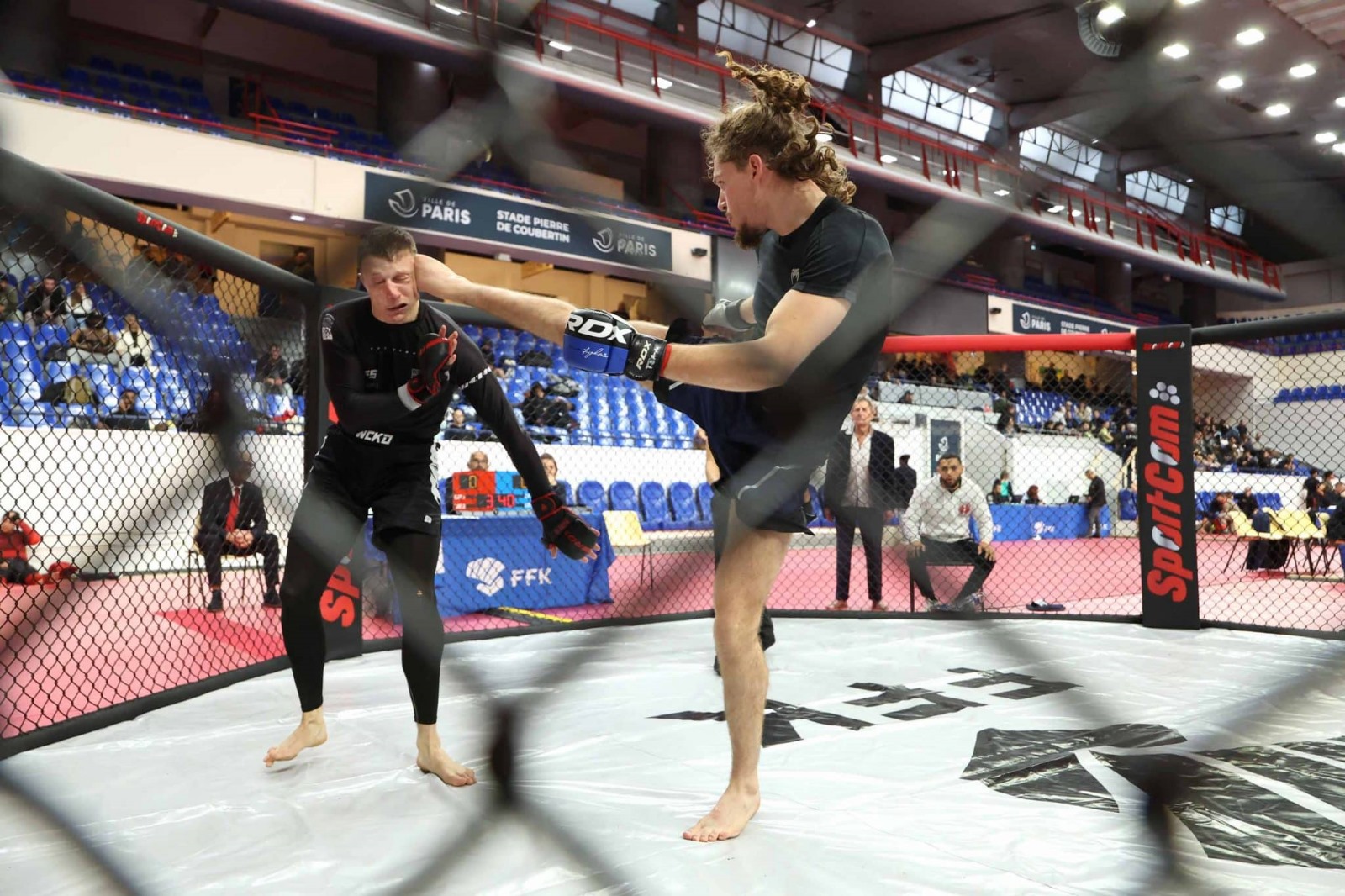 Entrainement de grappling lors d'un championnat de MMA